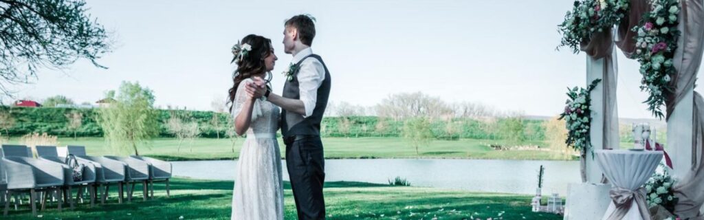 couple embracing eachtother at their outdoor bradford wedding
