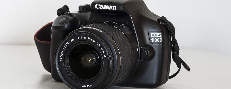 a digital camera on a table from a diy photo booth