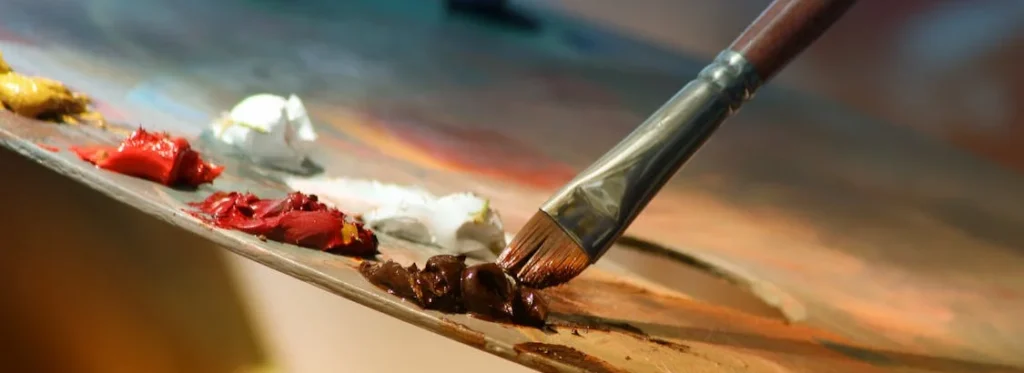 zoomed in paintboard and brush with paint colours at a wedding