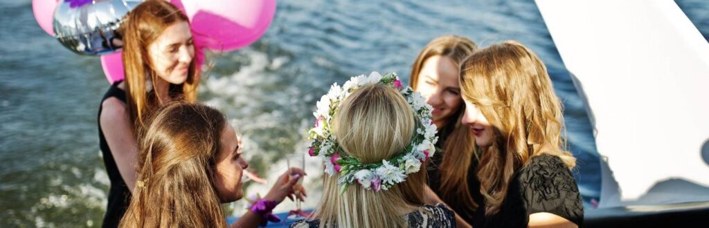 girls celebrating nye in manchester on a canal boat