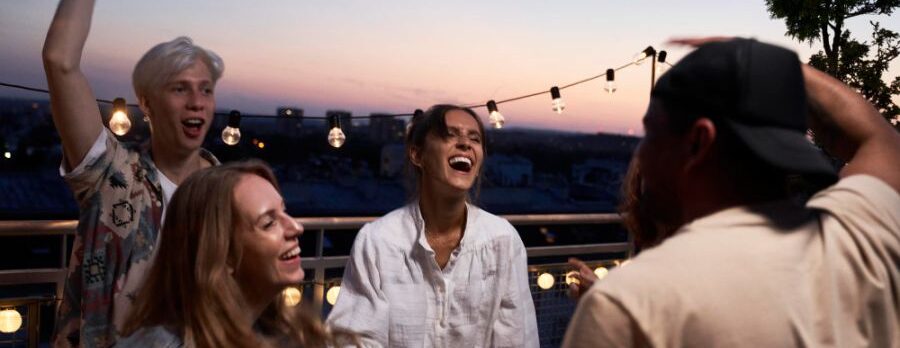 people enjoying a house party for manchester new years celebration