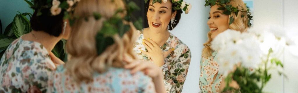 bridemades getting dressed in unconventional wedding attire