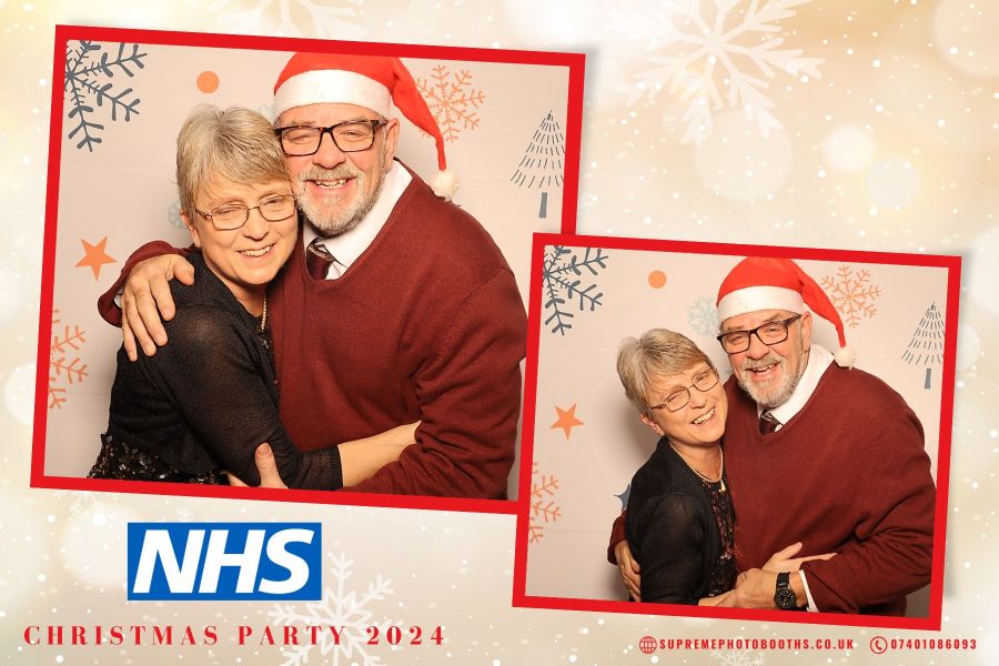 a group of staff from norther general hospital in sheffield taking a picture on a photo booth at their christmas party