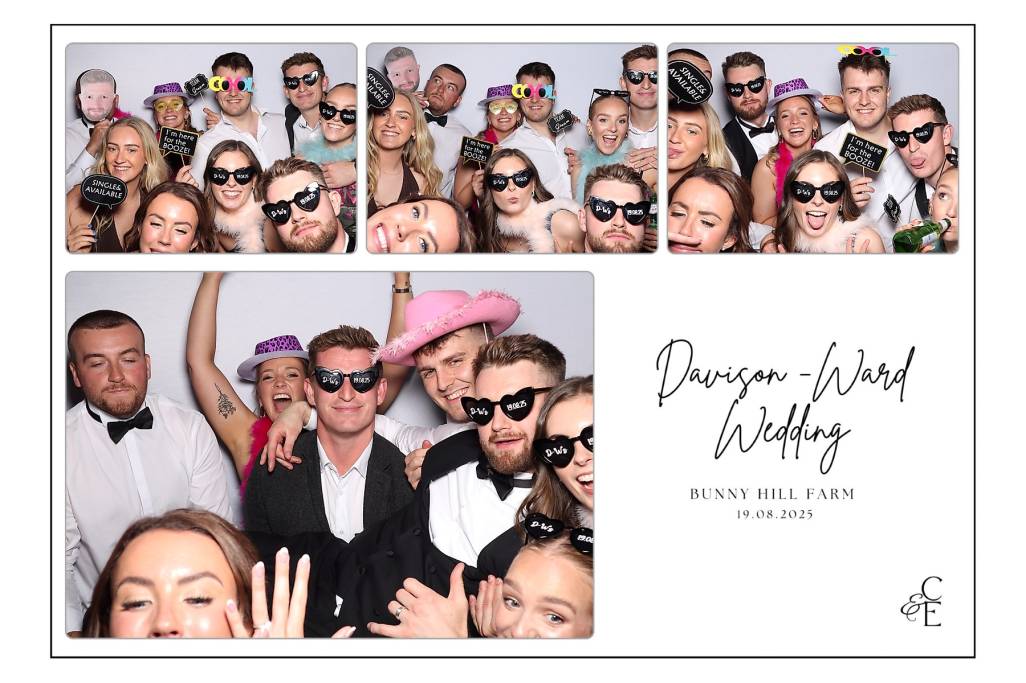 wedding guests and the bride and groom taking a group picture on a photo booth at a bunny hill farm wedding in york