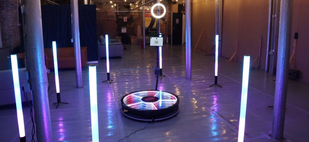 a 360 photo booth with an led lighting set up