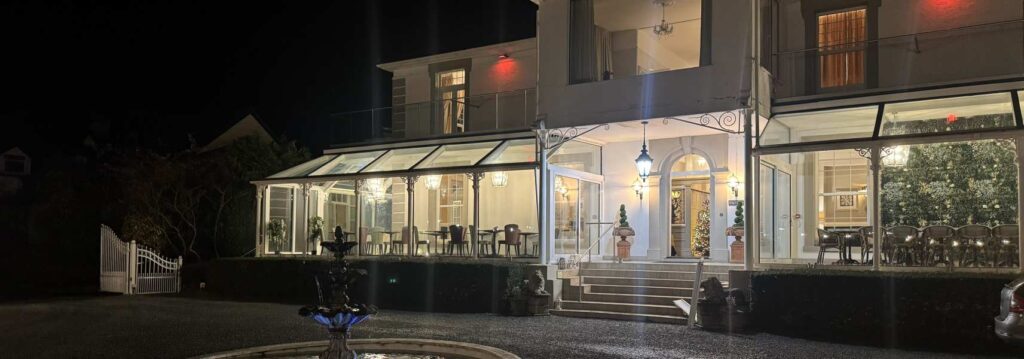 outside view of Plas Maenan wedding venue at night