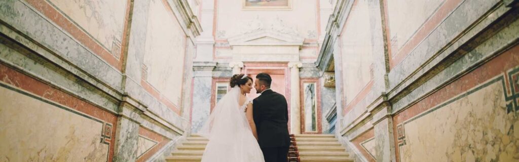 married couple walking into the distance inside left bank leeds