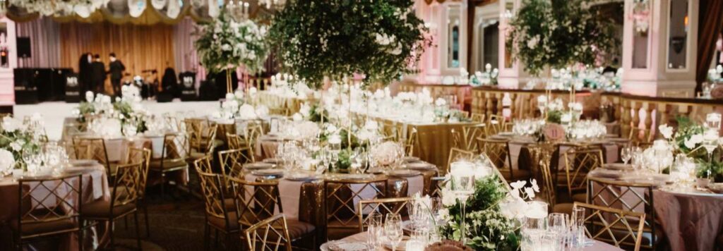 inside Merchant Taylors’ Hall with tables set up for a wedding