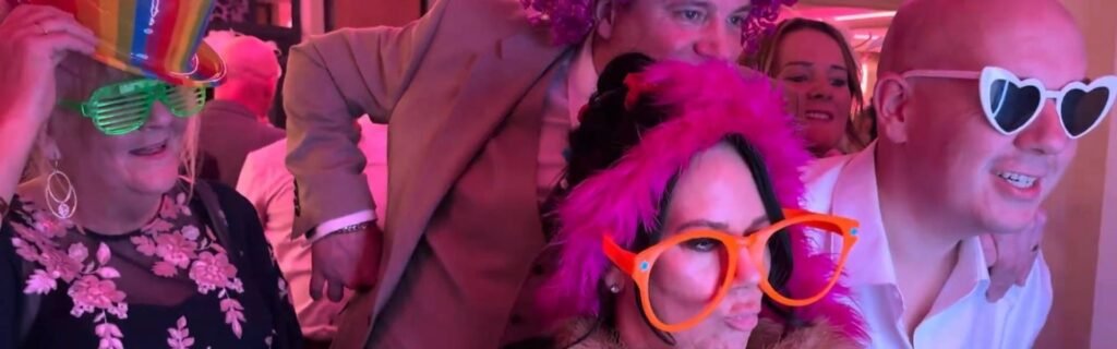 guests in props taking a picture