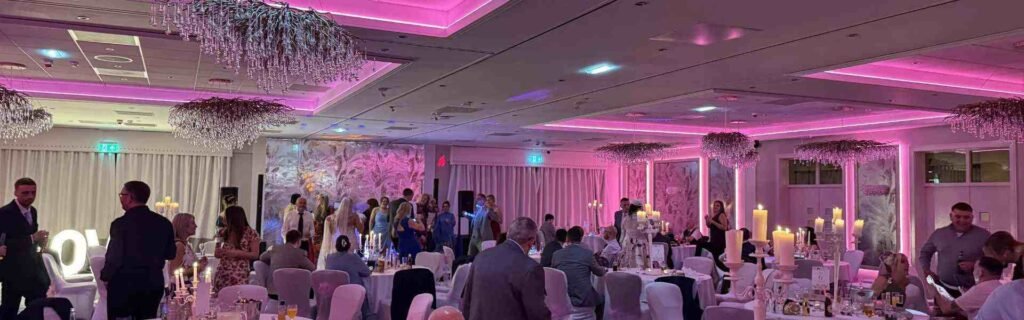 wedding guests sitting in reception room